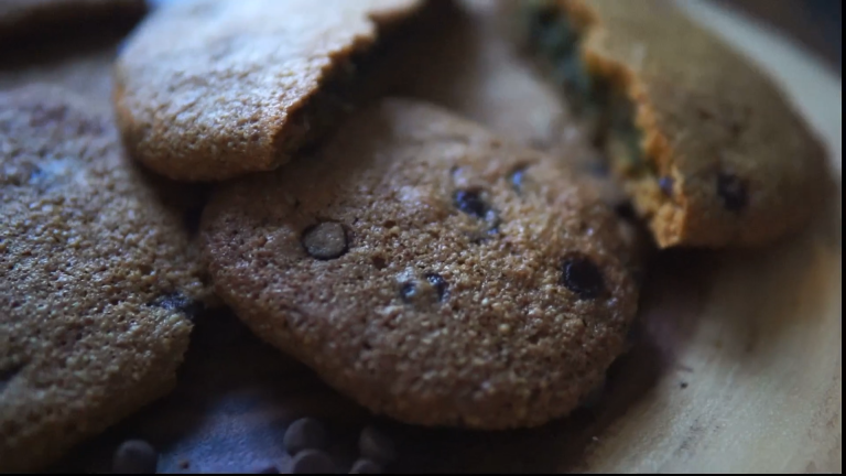Finished keto chocolate chip cookies without almond flour. Can see the cross section.